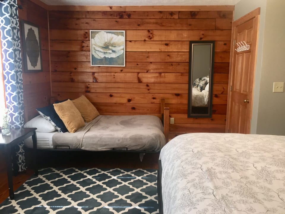 Futon in master bedroom can be converted to additional sleeping space