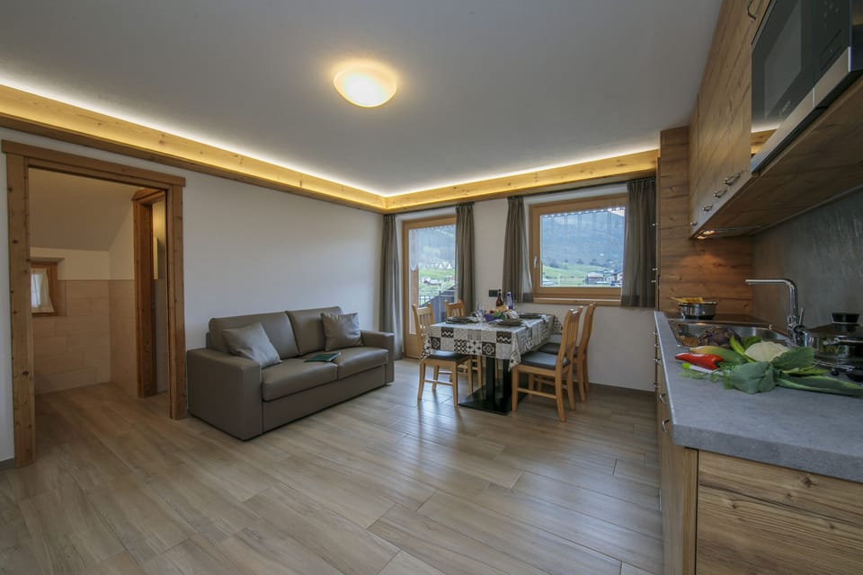 Living room with kitchen and dining area
