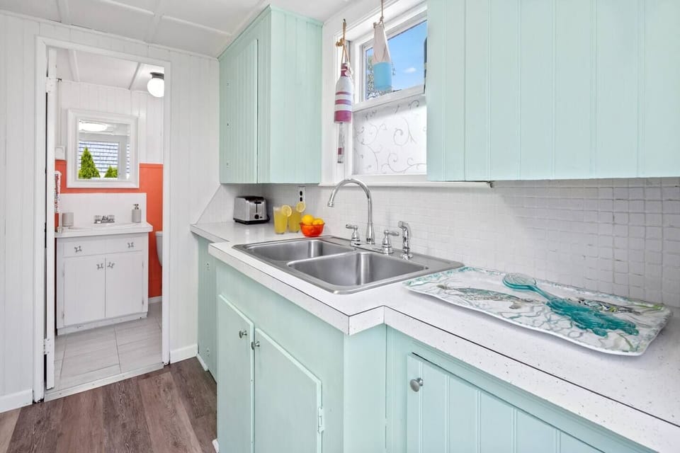 A spacious sink allows for easy dishwashing and cleaning.