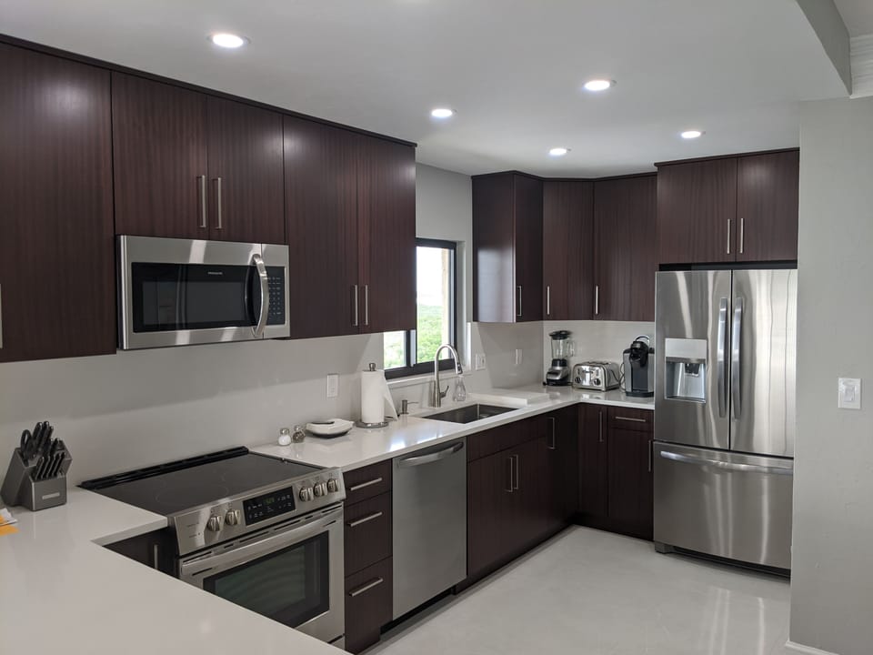 African ribbon wood cabinets