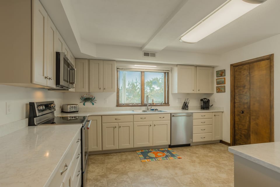 Brand new updated kitchen with state of the art stainless appliances.