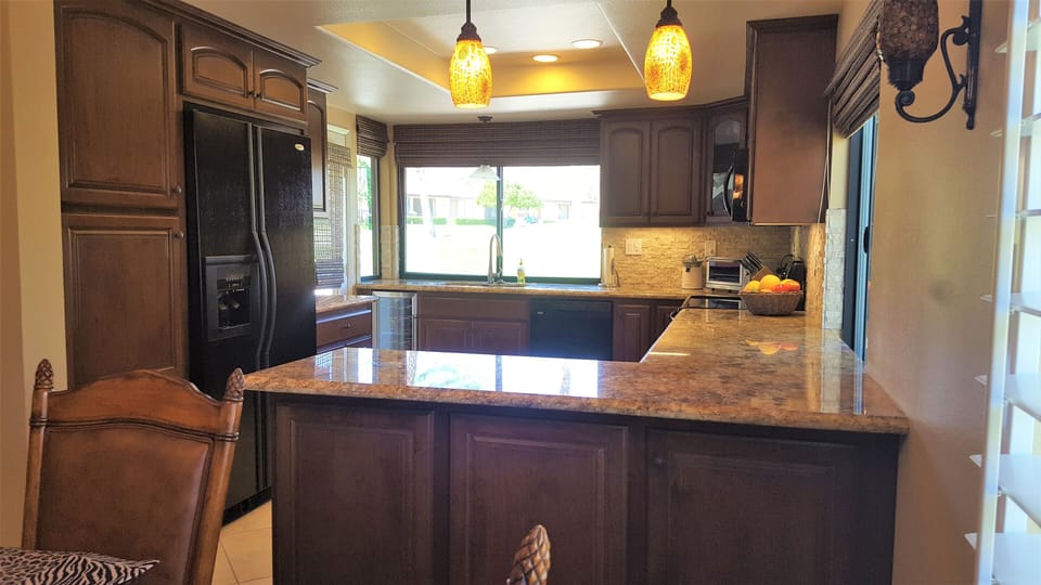 View from the dining area into the kitchen.
