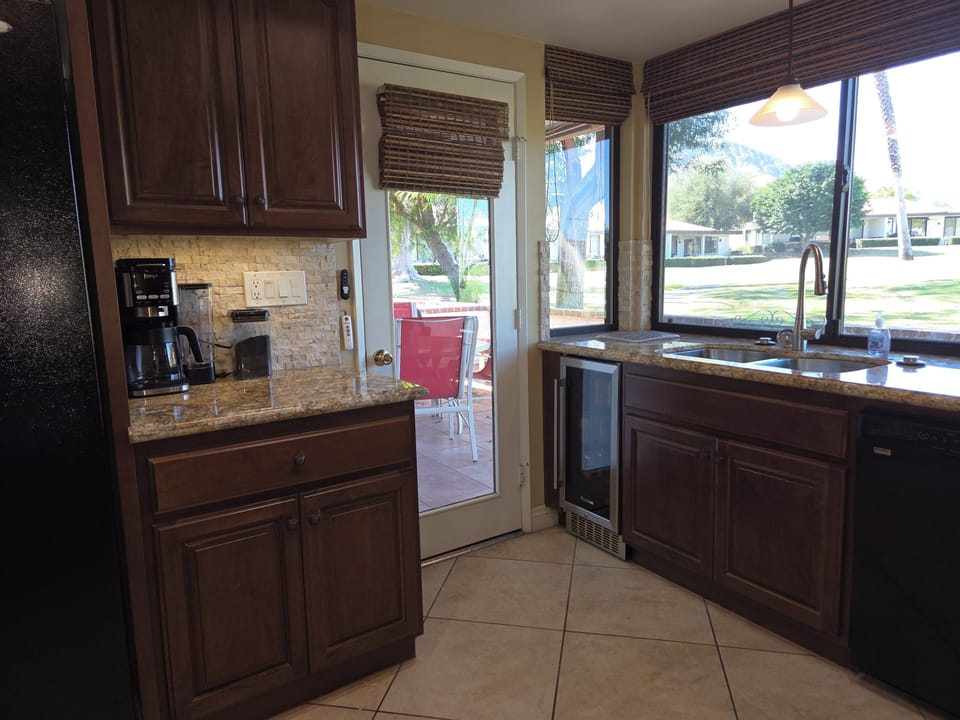 Kitchen - Coffee Bar, Beverage Refrigerator. Door to patio