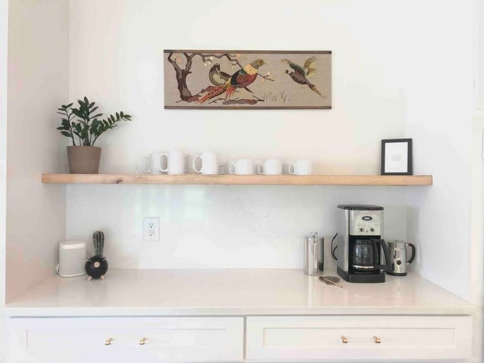 Kitchen complete with coffee bar.