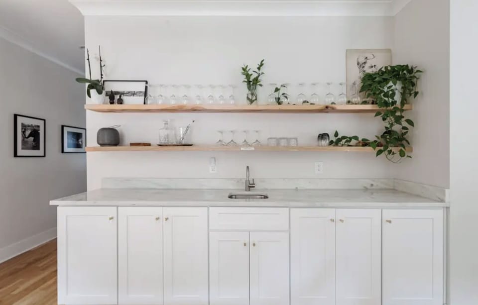 Wet bar across from the dining table for all of your entertaining delights.