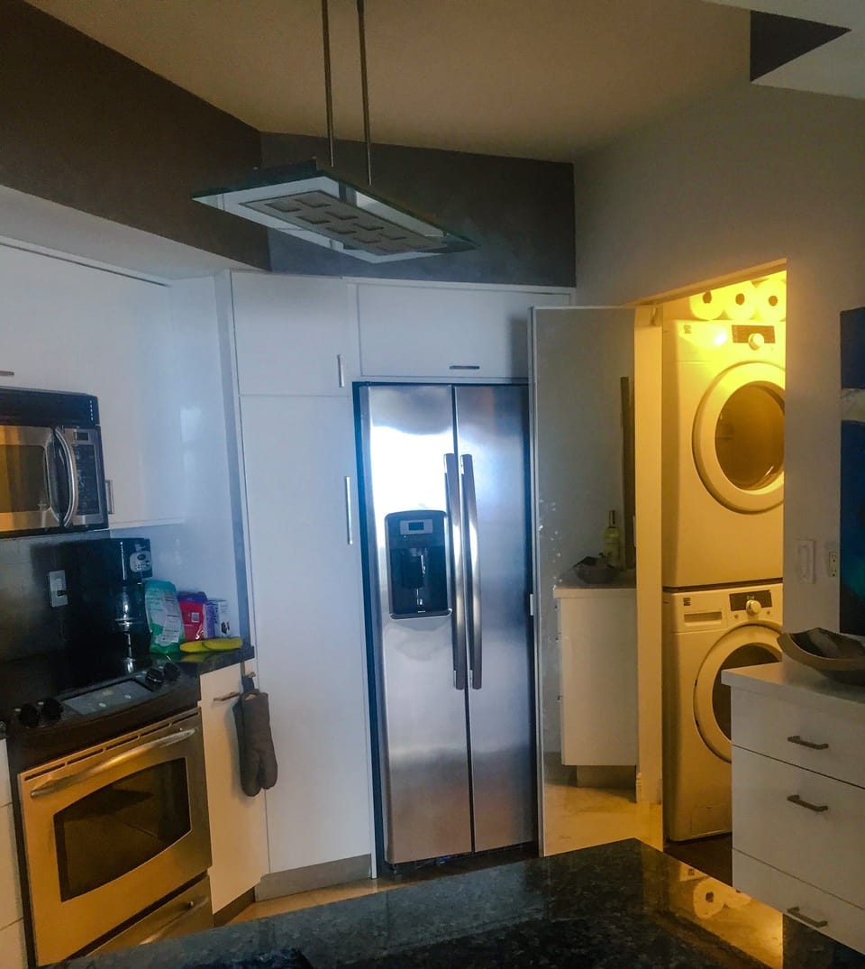 Laundry access through kitchen