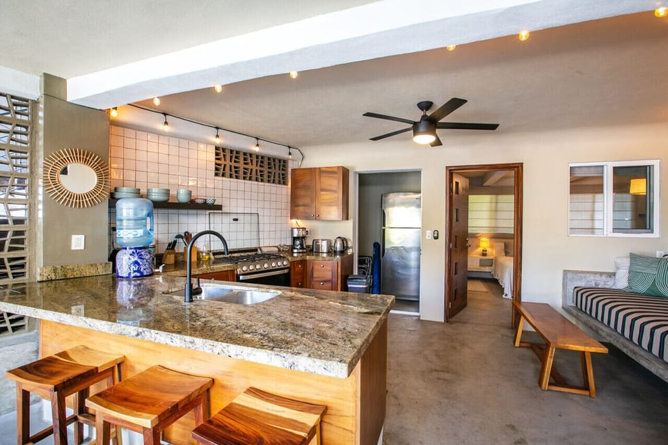 Open air dining/living and kitchen area