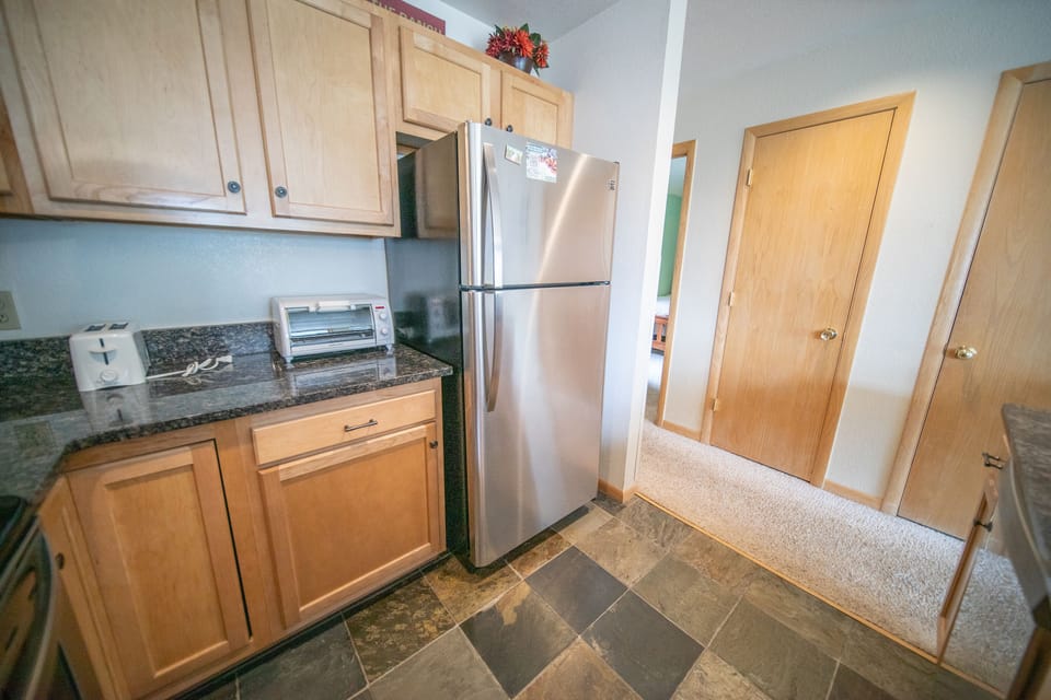 Kitchen and hallway to bedrooms