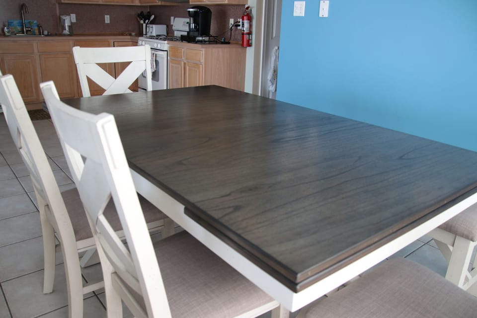 Table seats eight with pull out leafs on both ends. 
