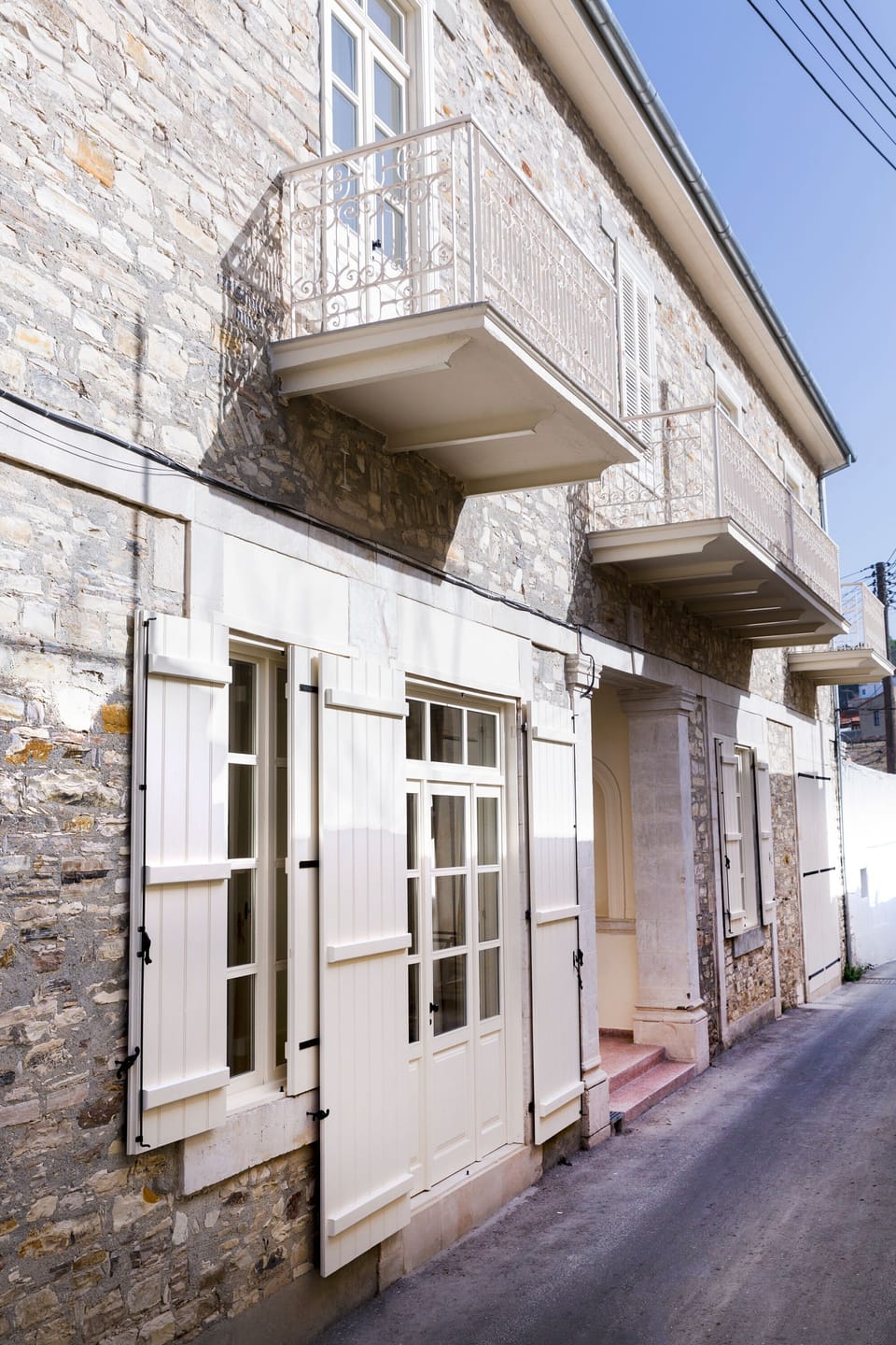 Facade of the house with the original balconies