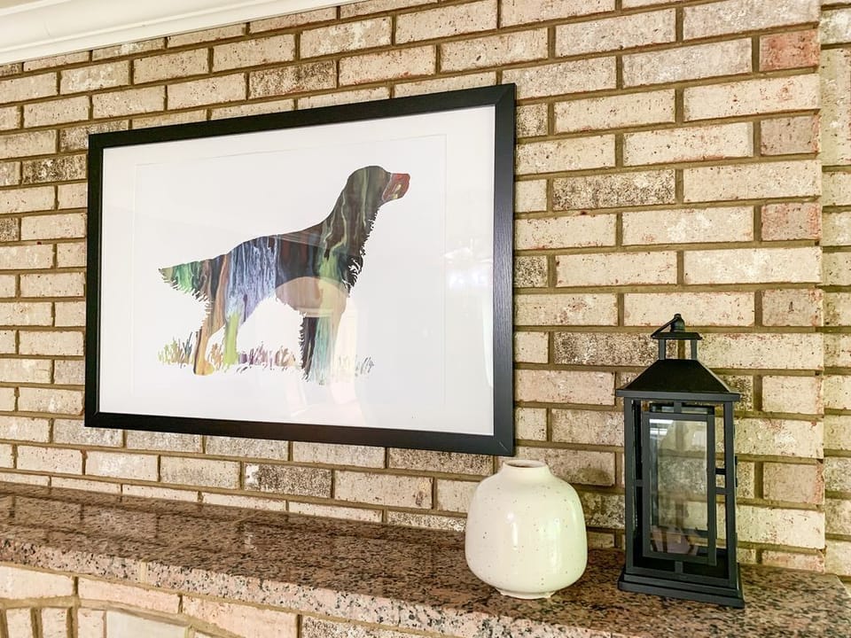 Mantle and decor in main level living area in Setter Haus.