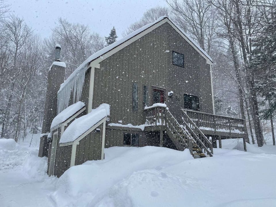 Chalet style home on private lot, wrap around deck