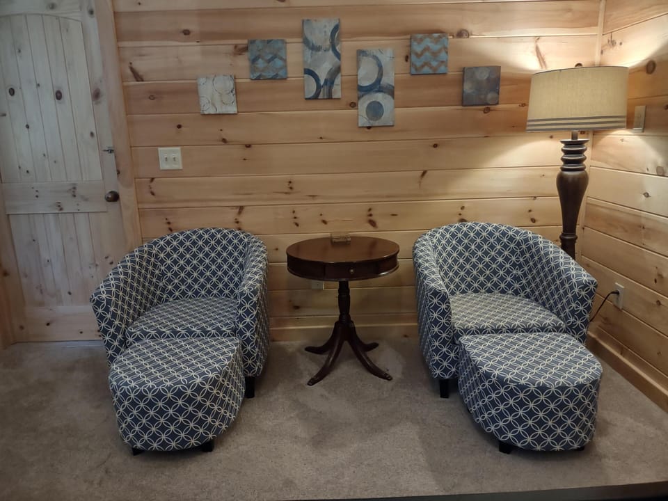 Large Master Bedroom (on main level) with sitting area. Ensuite full bathroom.