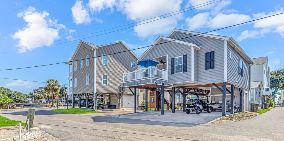 Front House - there is a Golf Cart at the property to rent.