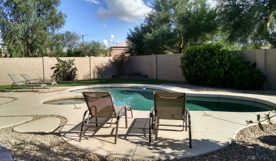 Pool and Spa with lounge chairs