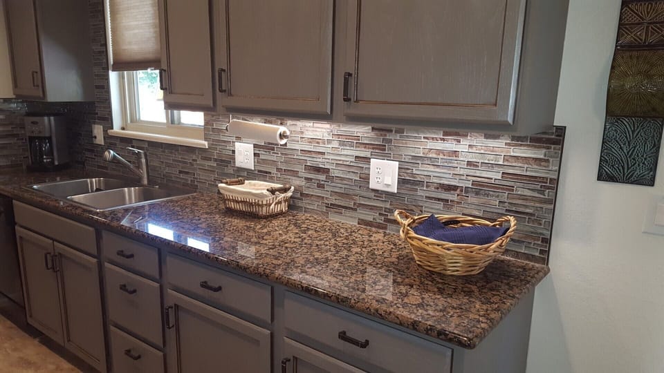 Under-cabinet lighting over granite counters
