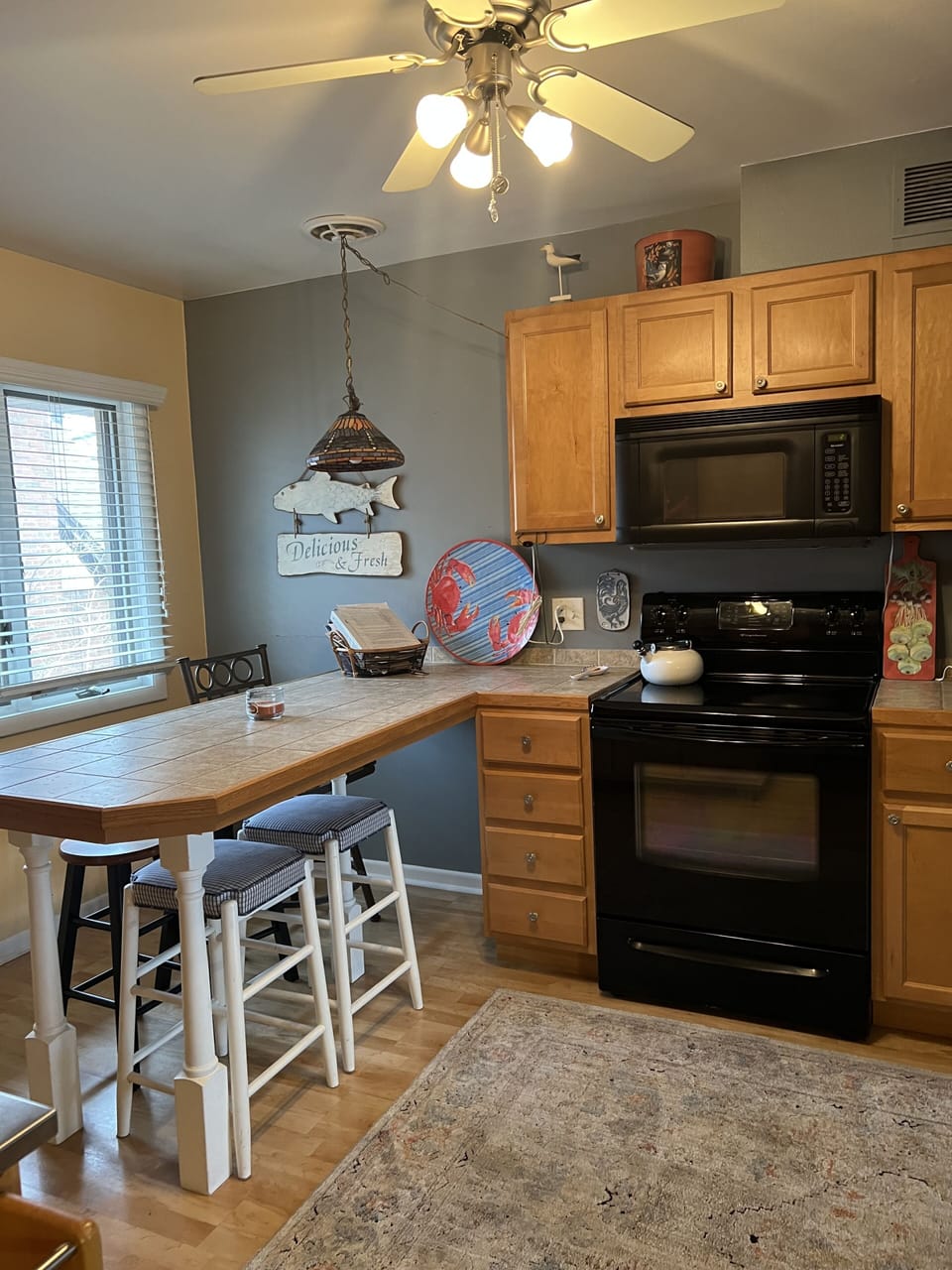  Well stocked kitchen with full oven and full refrigerator.