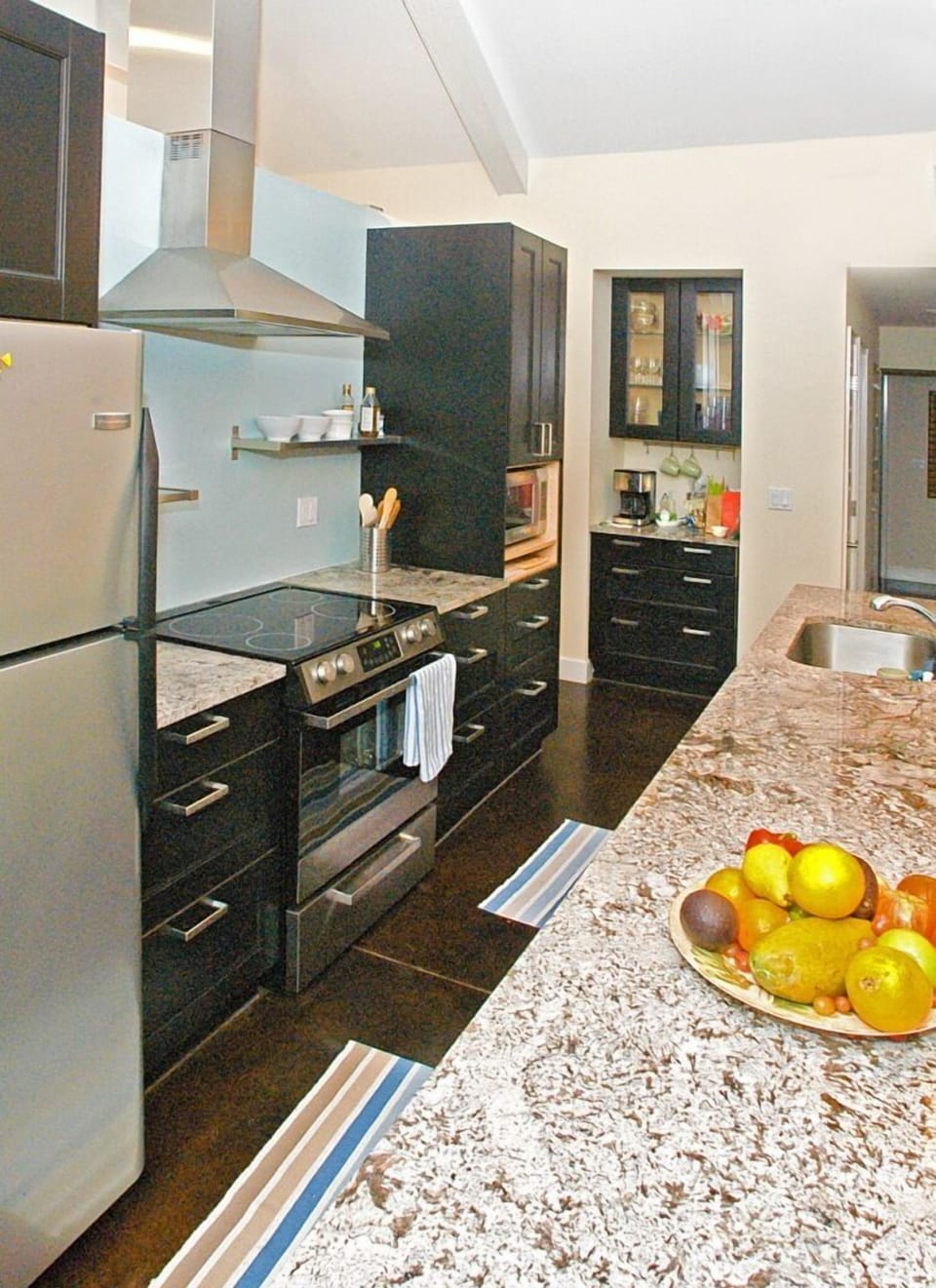 Kitchen and coffee bar.  Center island is 3' x 11' in size.
