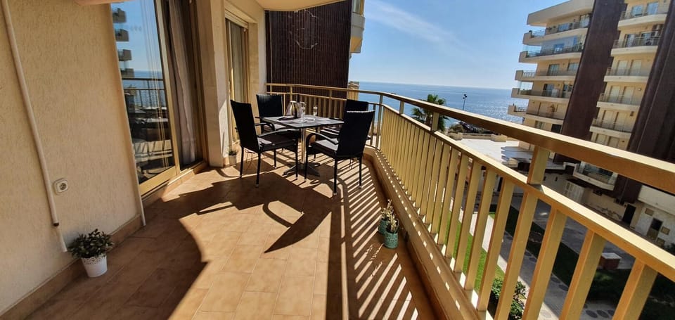 The balcony, overlooking the sea.