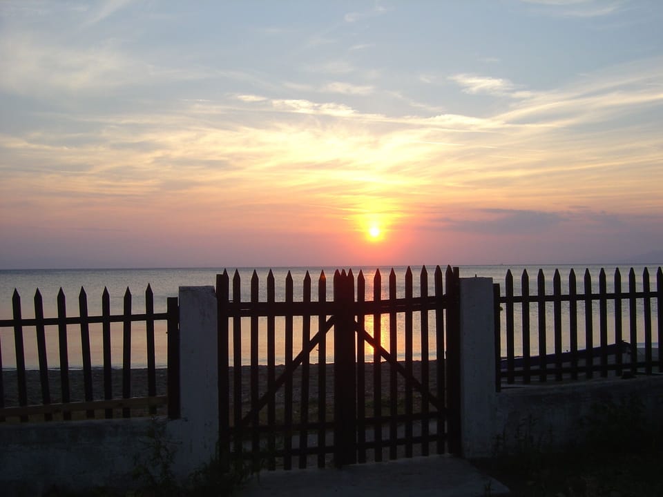 Beach view with sun setting