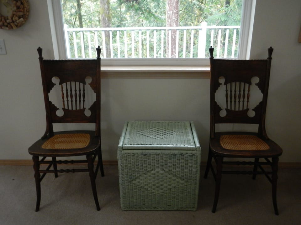 Antique oak chairs from the Missouri farmhouse of the owner's great-grandparents