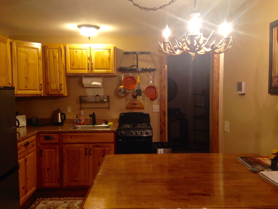 Fully equipped kitchen with a great view of the Confluence of the three rivers.
