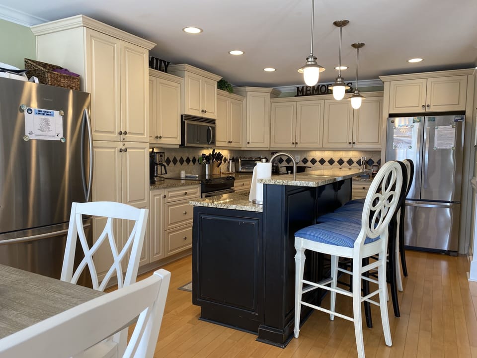 Well-equipped kitchen w/stainless steel appliances including TWO refrigerators