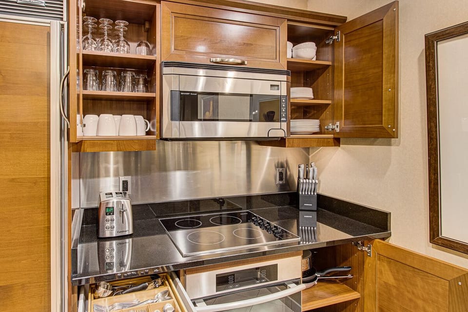 We stock our kitchen with more glassware, dishes, pots and pans than most!
