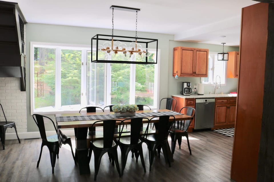 Dining area with plenty of seating and modern lighting