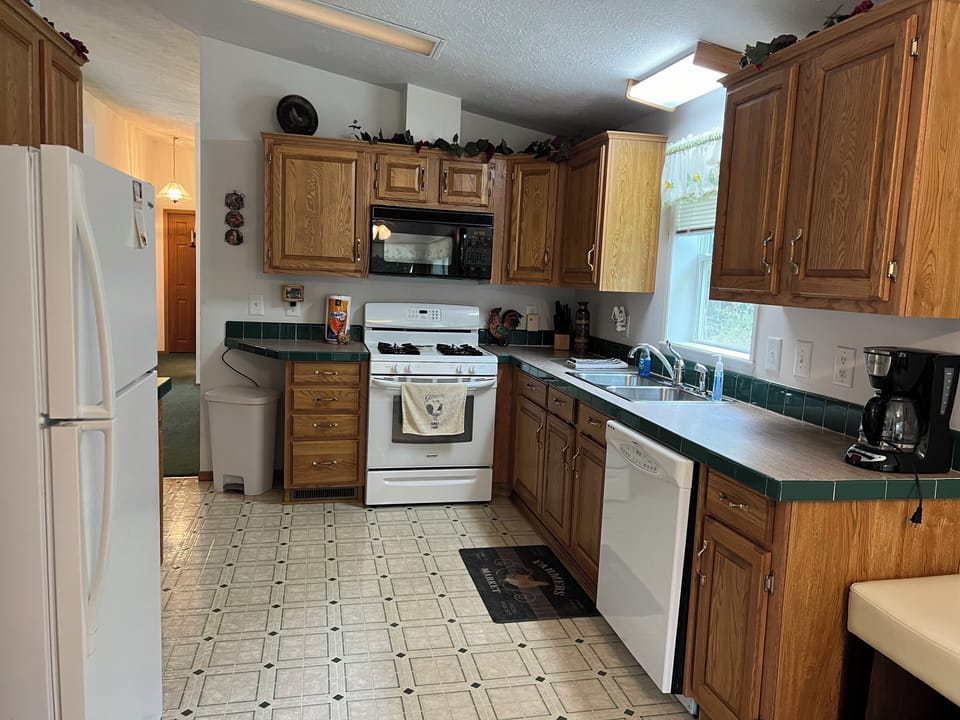 View of kitchen area from breakfast nook area