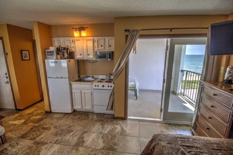 Flooring, Floor, Room, Indoors, Refrigerator