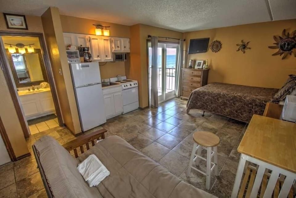 Furniture, Indoors, Room, Refrigerator, Couch