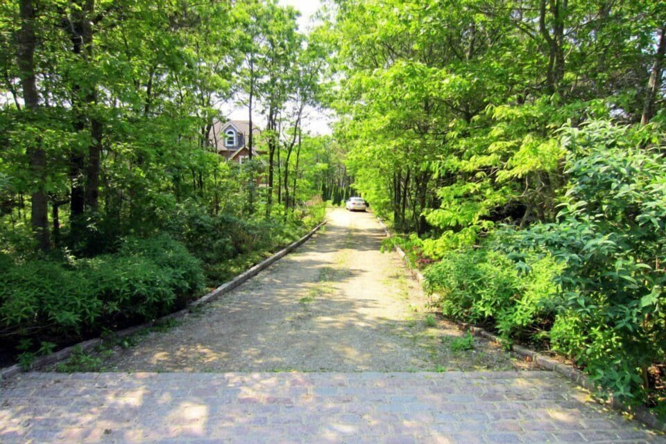 view of house from street facing driveway.