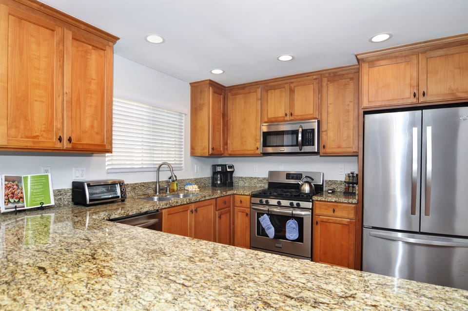 Gourmet Kitchen is Fully Stocked with Cookware and Serving Ware