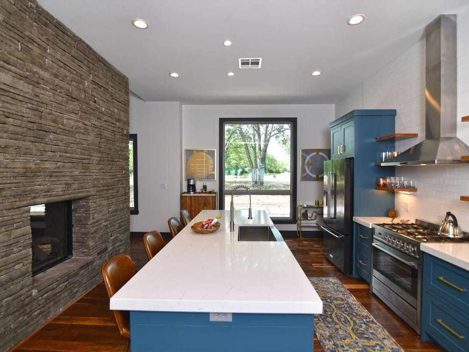 Gourmet kitchen w/ all the stuff! Quartz countertops, large island, Fireplace!