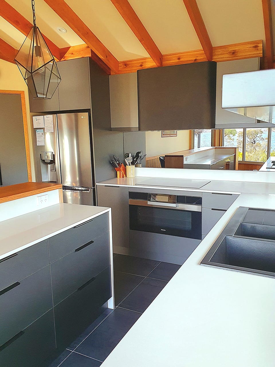 New kitchen features Miele appliances, 2 dishwashers and a large fridge/ freezer