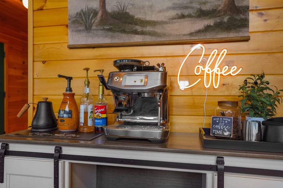 Fully Stocked Espresso Bar with syrups and fun drizzles to spice up your daily coffee routine.