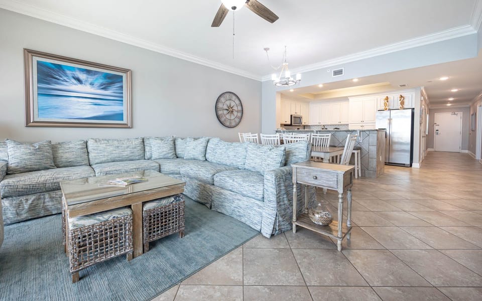 Unwind on the spacious couch, the perfect spot to enjoy laughter and stories with loved ones in this inviting space