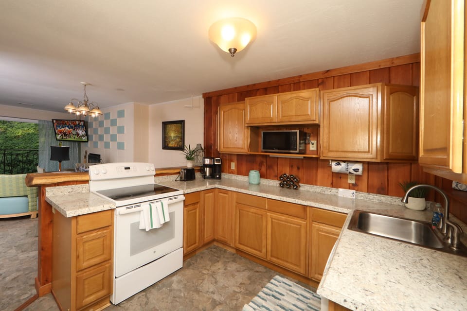 Full, stocked kitchen with spice rack