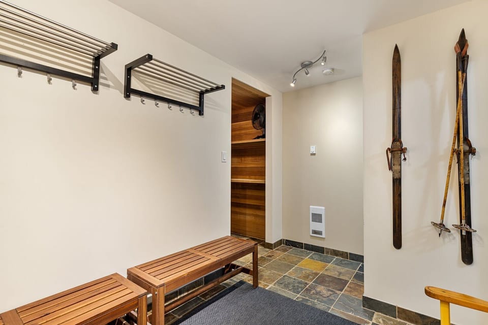 Downstairs mudroom with storage for boots and gear