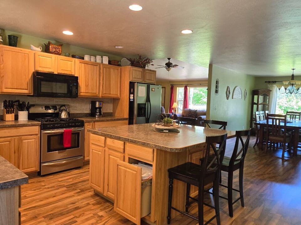 The Kitchen is the center of my home. Very spacious and roomy for larger groups.