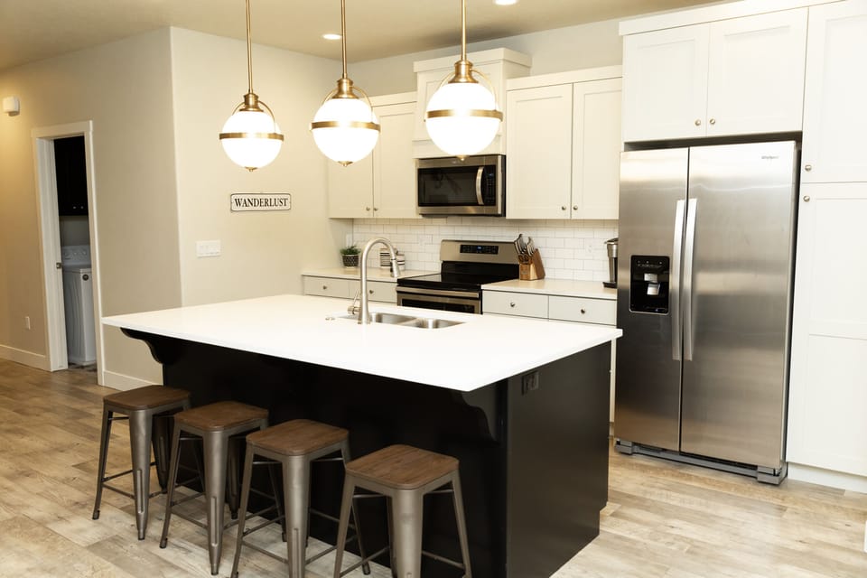 Kitchen island, appliances and seating