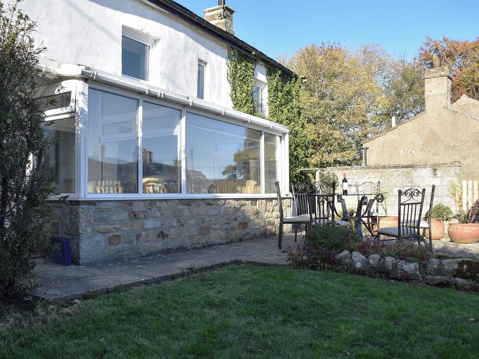 Garden and outdoor seating area | Thistle Cottage, Carlton-in-Coverdale