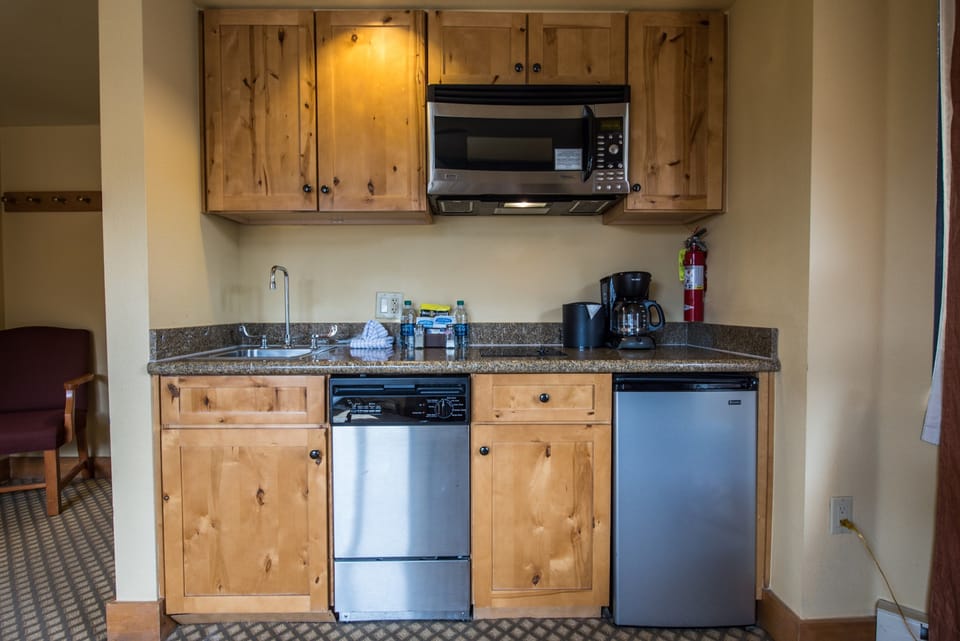 The kitchenette comes equipped for your convenience.
