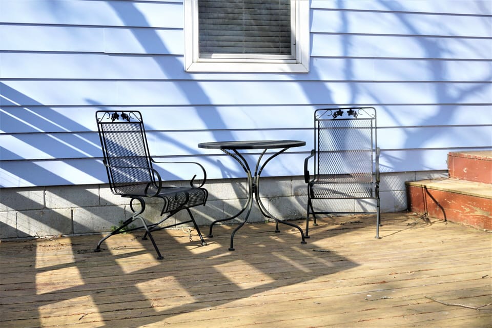 Front viewing deck, overlooking the neighborhood, across the street from a park.