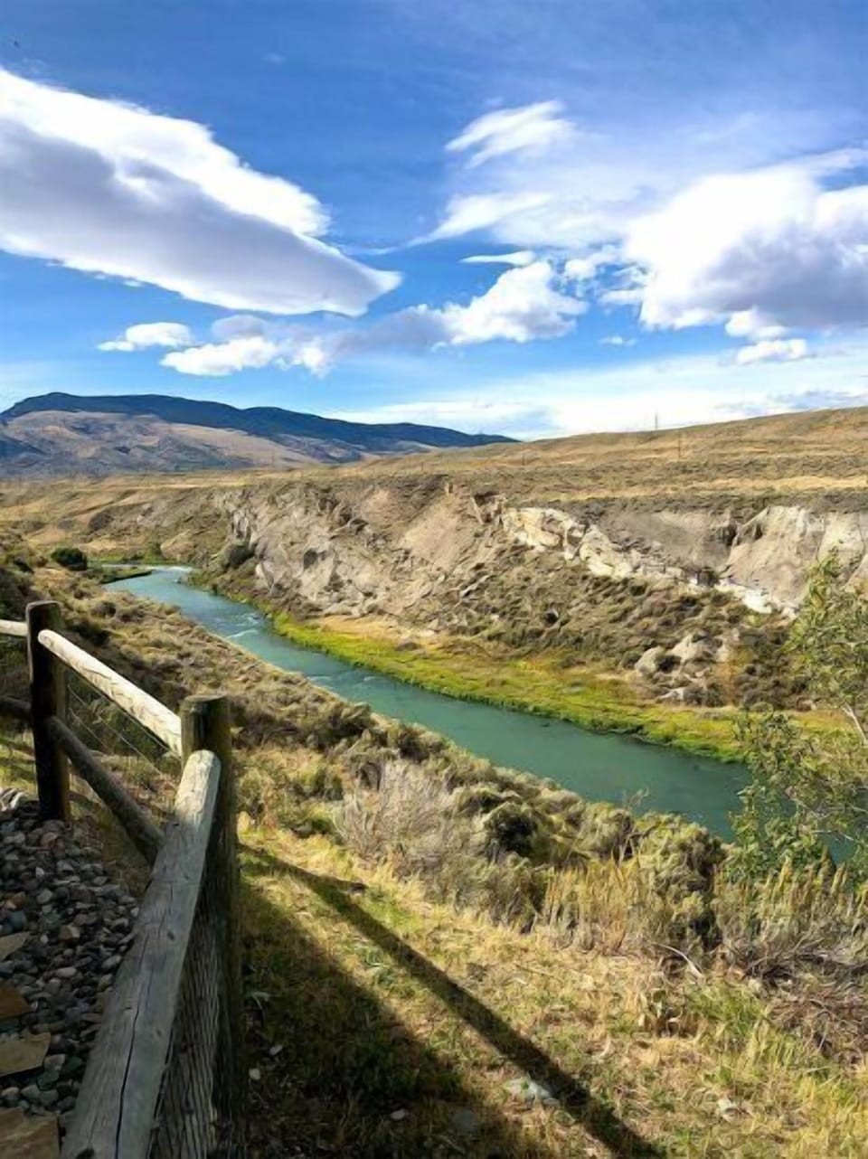 The Shoshone River beckons anglers while Rattlesnake Mountain rises in the background