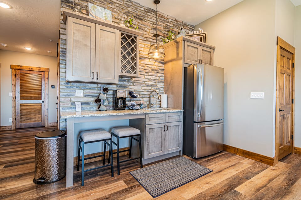 Lower level kitchen with a second fridge!