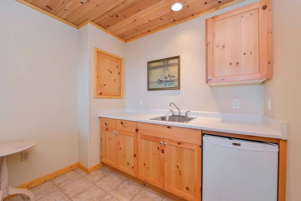 Cabin acts as fourth bedroom and third bathroom. 