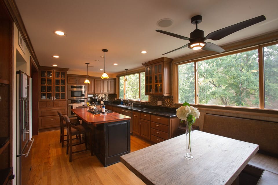 Incredible kitchen, level two. Huge windows with tree top views. 