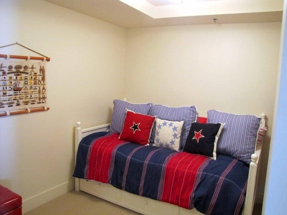 Den with  twin daybed and pull out twin bed.  